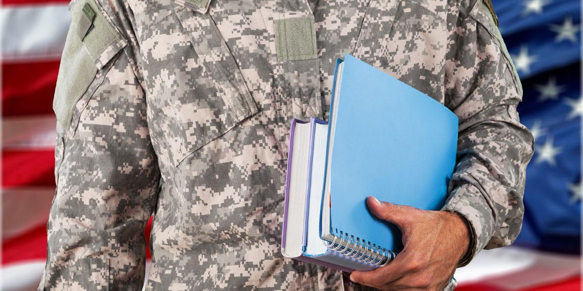 Military man in uniform with books.